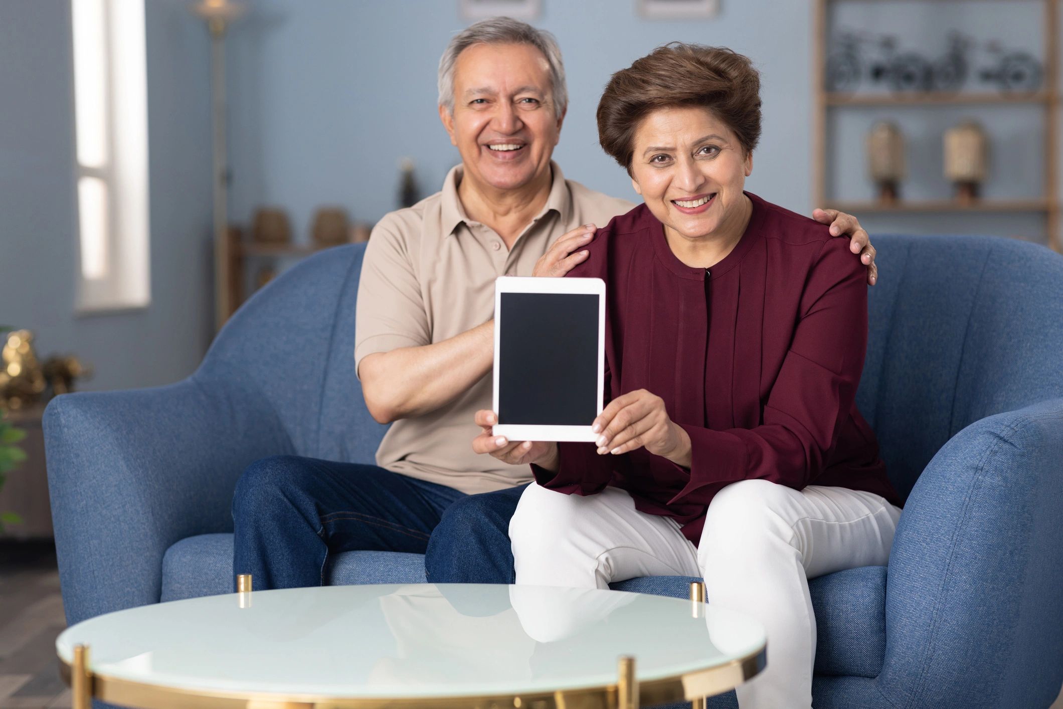 Senior couple reviewing financial plans together at home