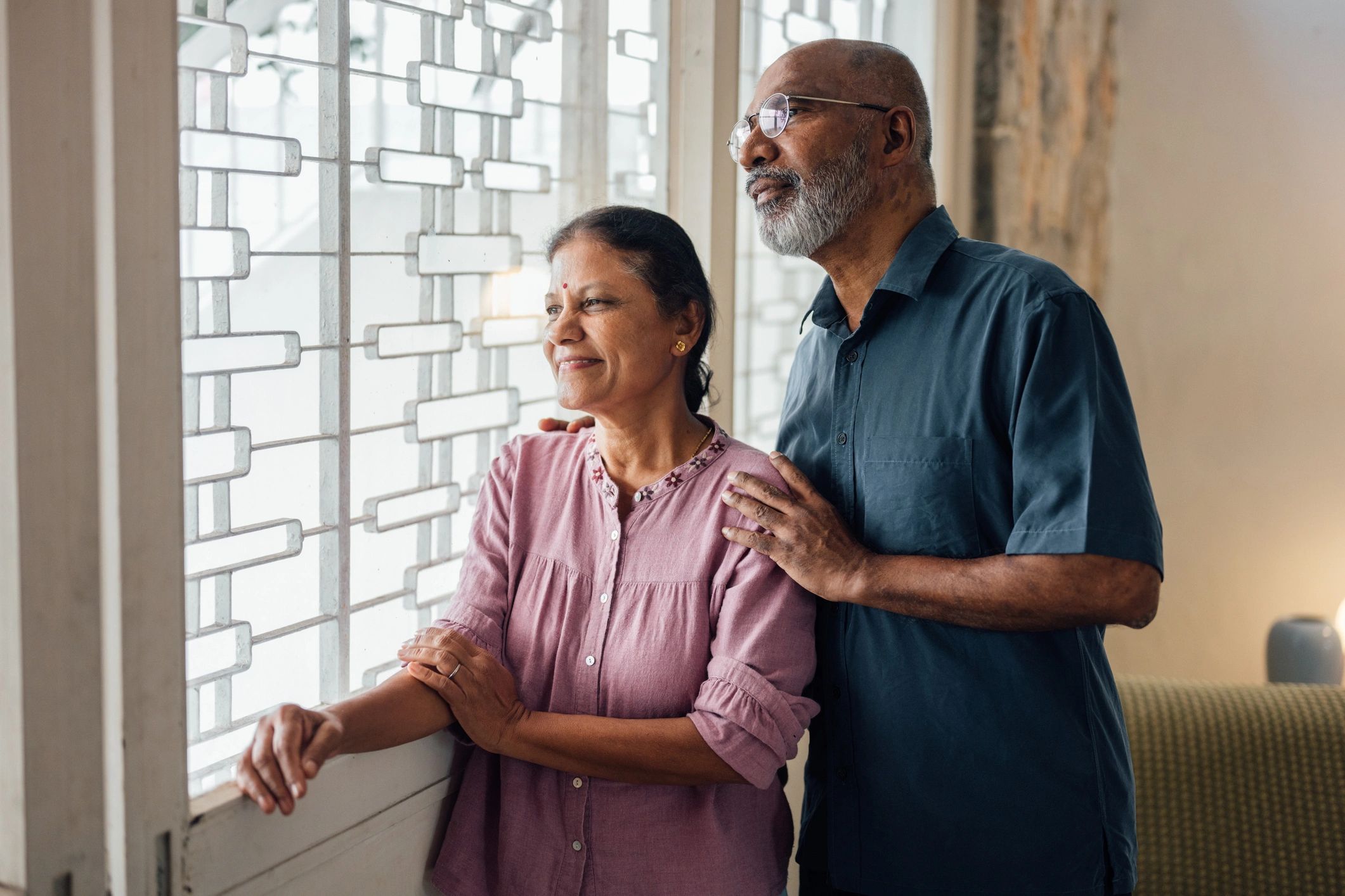 Happy senior Indian couple smiling together
